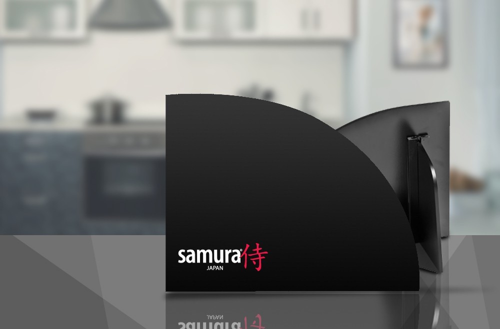 Подставка магнитная для стальных ножей Samura KS-002 Подставка магнитная для стальных ножей Samura KS-002Держатели для ножей Samura<br>Подставка магнитная для стальных ножей Samura KS-002<br>Подставка магнитная односторонняя черная. Глубина 165 мм, если ставится на поверхность или 10 мм, если крепится непосредственно к стене.<br>Стильный и необходимый атрибут на Вашей кухне для хранения ножей Samura. Полукруглая подставка из дерева (МДФ), магнит спрятан, поэтому лезвия Ваших ножей не царапаются. Наша магнитная подставка Samura - это самый безопасный и правильный способ хранения металлических ножей. Имеет специальные крепления для настенной установки.<br>Официальный сертифицированный продавец Samura™<br>